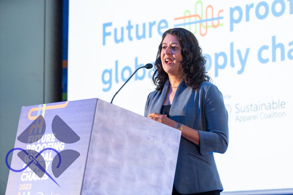 Photo of Amina Razvi at podium at Planet Textiles 2023