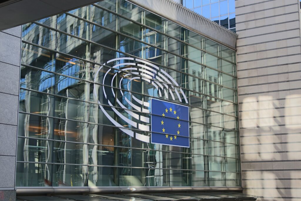 Detail of the facade of the European Parliament 'Paul Henri-Spaak' building via Unsplash.