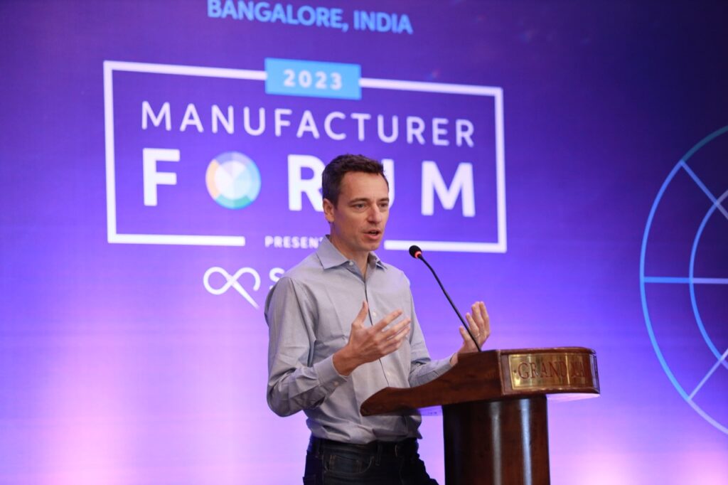Jeremy Lardeau speaking on stage at the Manufacturer Forum: Bangalore