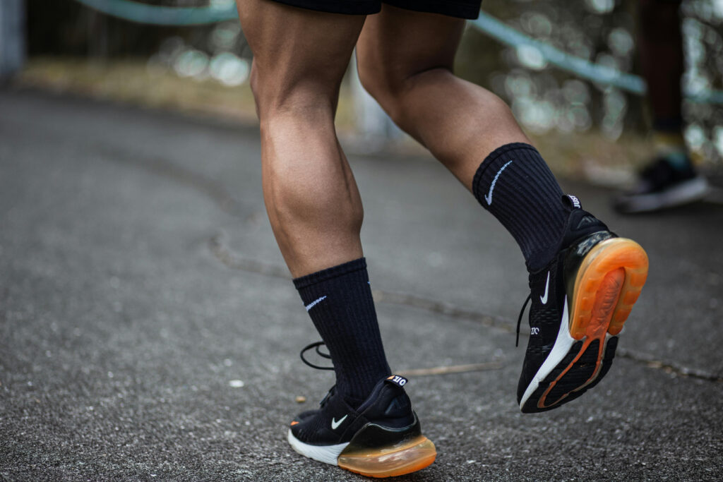 Close-up photo of runner wearing Nike running shoes