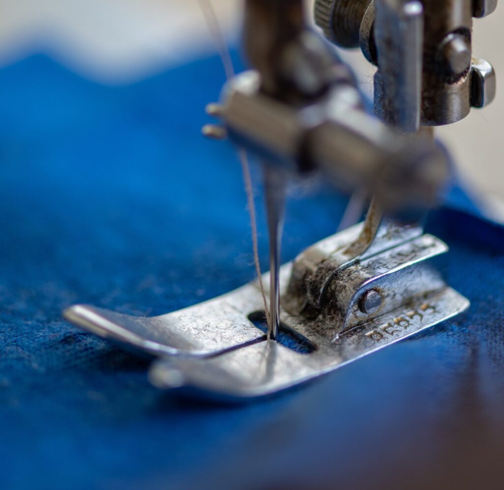 Close-up photo of an industrial sewing machine