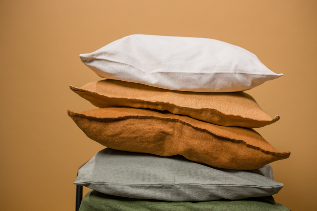 Stacked earth toned pillows