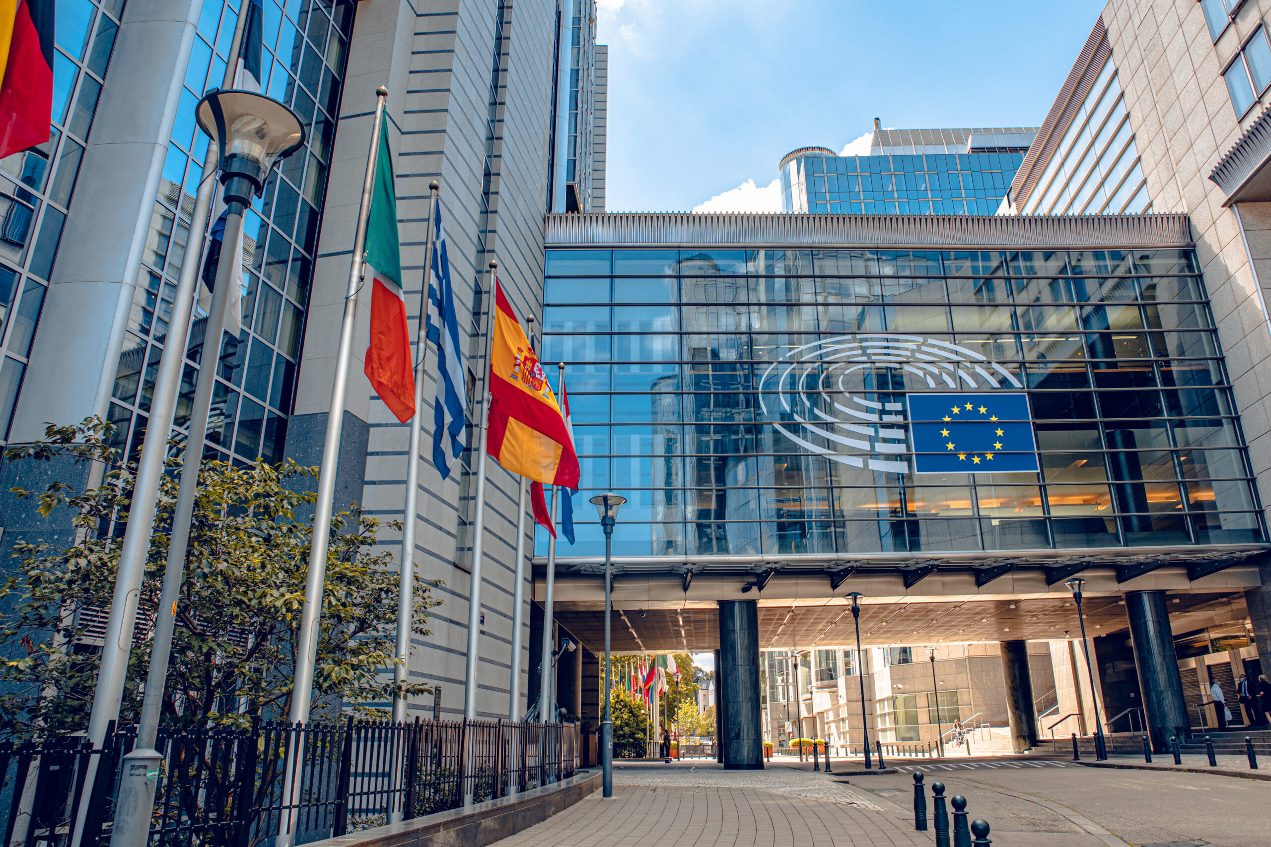 Brussels, Belgium. European Parliament offices and European flags.